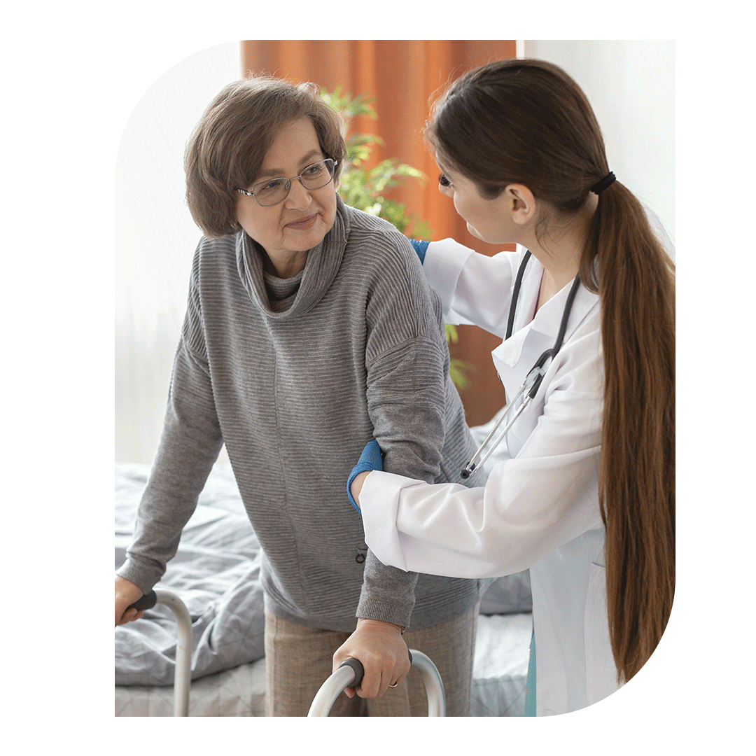 NDIS in-home personal care: caregiver helping elderly client with walker in Brisbane